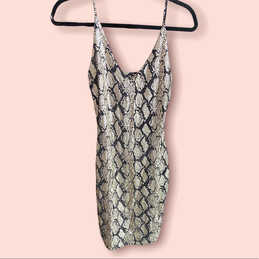 Stretchy snakeskin mini